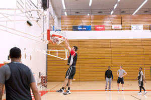 A Pioneer player dunks the ball.