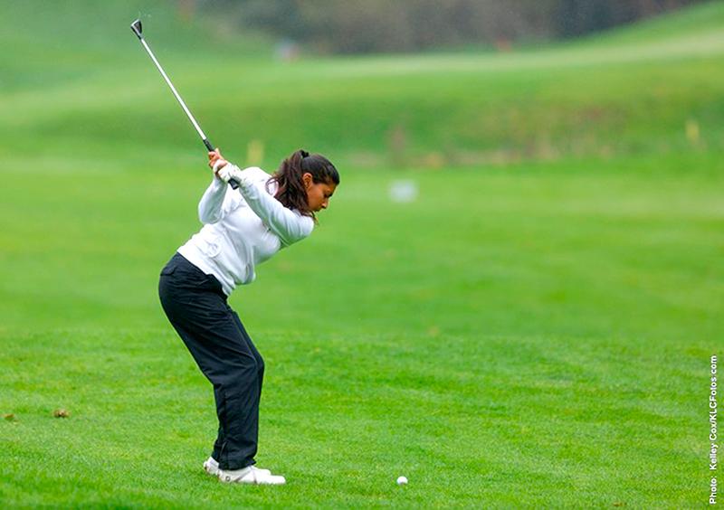 Andrea Castellanos, in her back swing, attempts to reach the green.