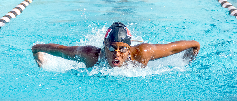 Mariam Lowe competes in the 200-yard butterfly event where she finished first with a time of 2:17.73 during a home meet against Mills College.