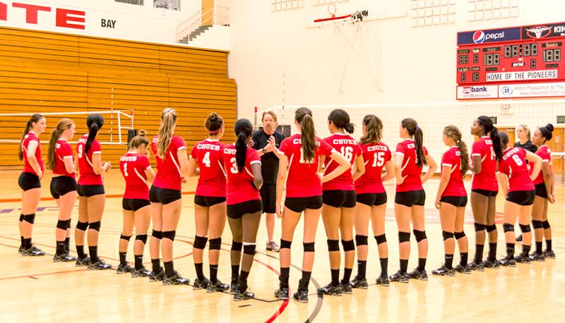 Women%E2%80%99s+volleyball+coach+Jim+Spagle+addresses+his+team+on+Tuesday+at+Pioneer+Gymnasium+during+practice.+