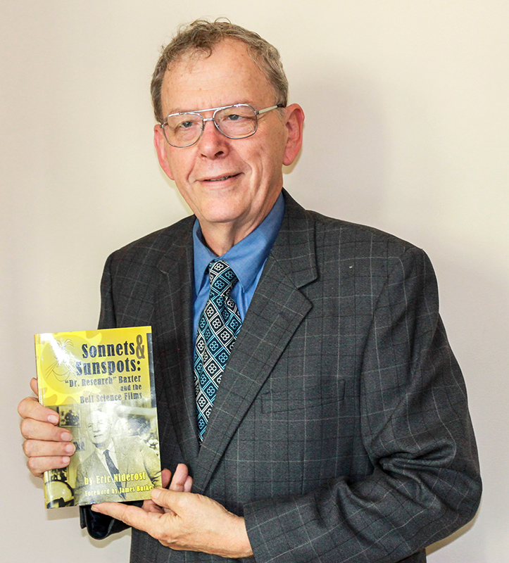 Cal State East Bay Alum Eric Niderost posed with his book “Sonnets and Sunspots” last month at Chabot College.