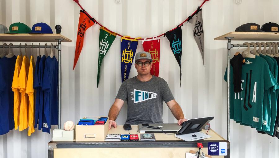 The D.H. Company co-founder Adam Mayberry sits at their pop-up shop in Downtown San Jose.