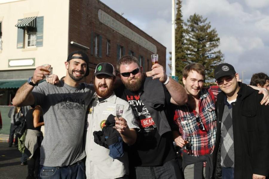 Double IPA Fest goers show off their beers at the Feb. 7 event in downtown Hayward.