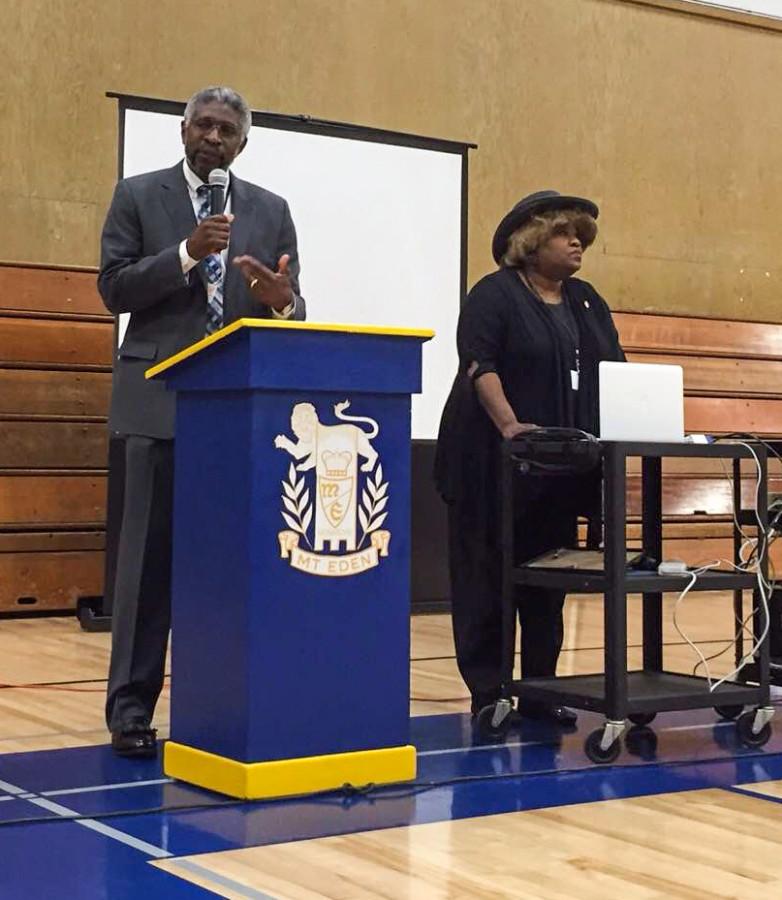 Pastor Tommy Smith speaks with the NAACP President Freddy M. Davis on Saturday at Mount Eden High School in Hayward. 