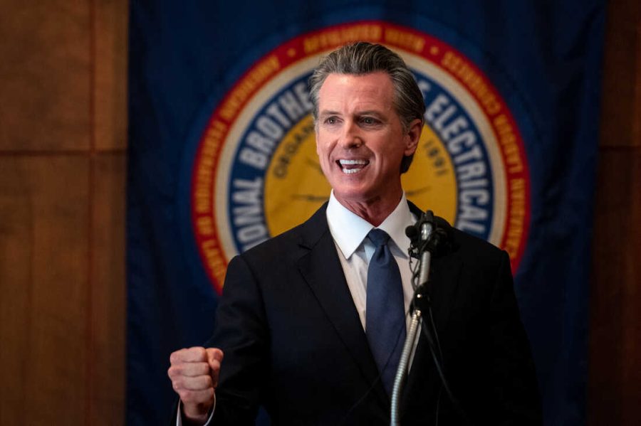 California Gov. Gavin Newsom stops at IBEW Local 6 union hall in San Francisco on Sept. 14, 2021, to speak with union workers and volunteers.
