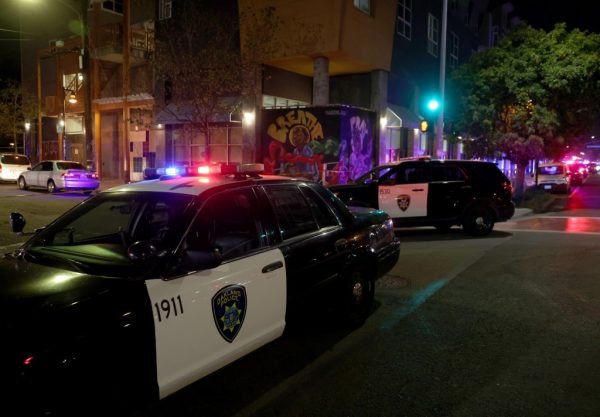 Oakland Police investigate a shooting near downtown in West Oakland (Photo Courtesy: Jane Tyska/Bay Area News Group)