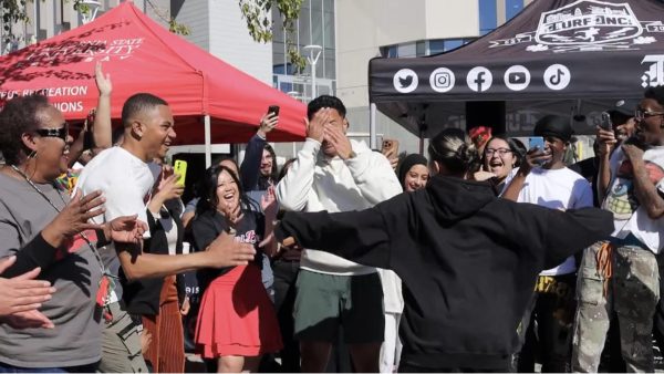 CSUEB student Lio in disbelief after fellow student Malia dances in his 
face during the Block Party dance battle. February 20, 2025. 
