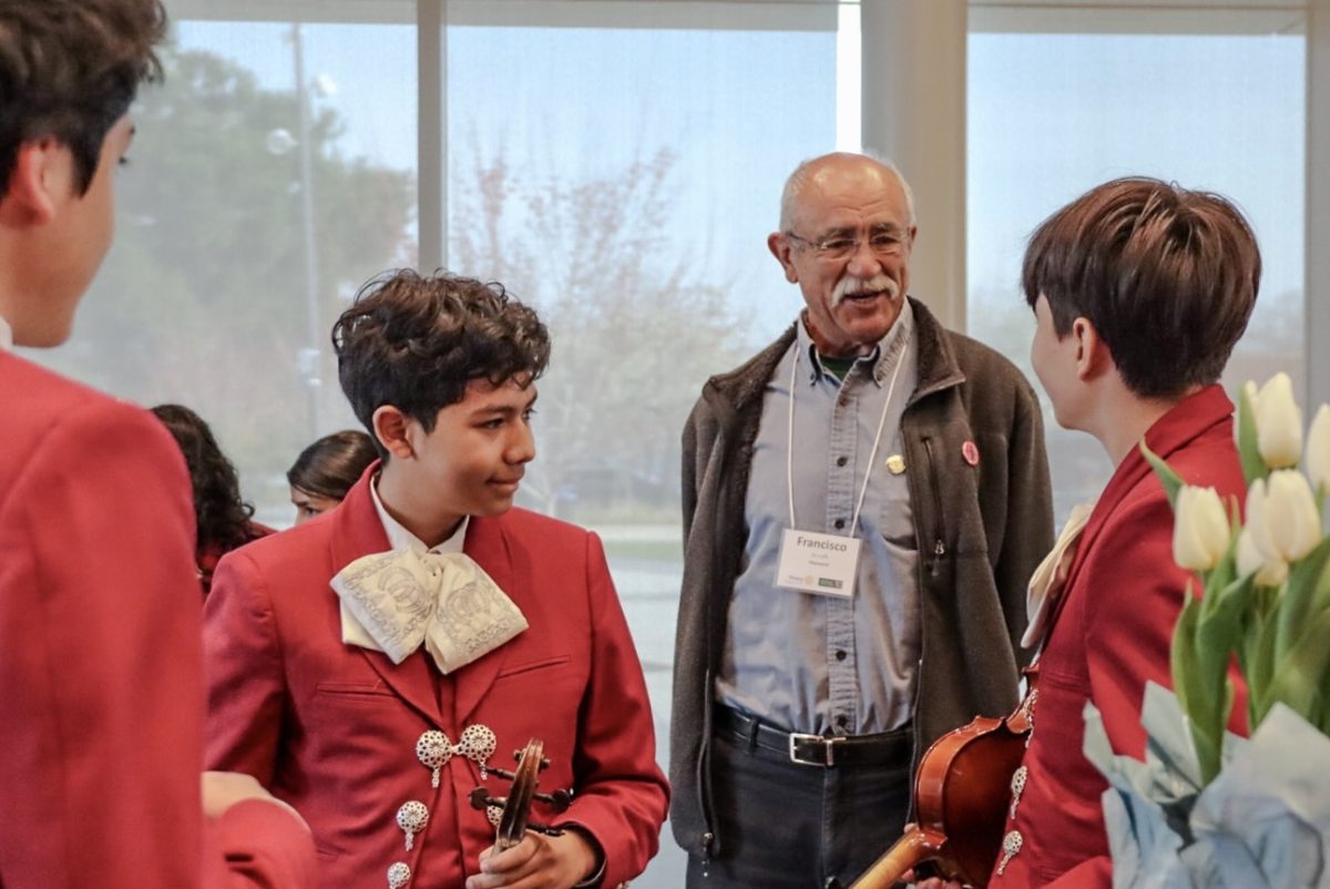 Francisco Zermeño (center right), Hayward City Councilmember and Hayward Rotary Club President sharing his appreciation to youth members of Mariachi Ilusión at the Rotary District 5170 Mid-Year Leadership Celebration.