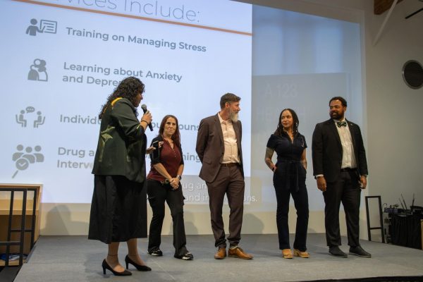 (From left to right) Dr. Nicole Pierce-Davis, Tami Martinez, Dennis Guikema, Dr. Rachel Cobb, and Gregory Brown speak at the 2026 Community Partnership Expo held at the Zero Net Energy Center in San Leandro on May 6.